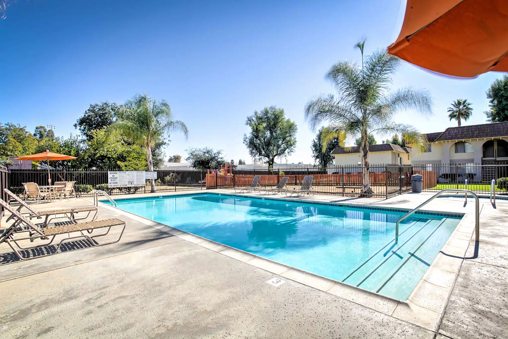 Shadow Mountain Apartments community pool lounge area