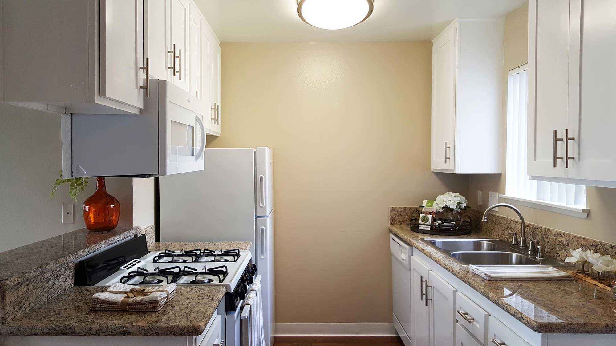 full white appliance package kitchen at Shadow Mountain